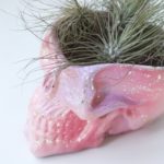 Pink ombre concrete skull planter by Modern Plant Life