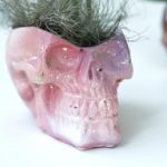 Pink ombre concrete skull planter by Modern Plant Life